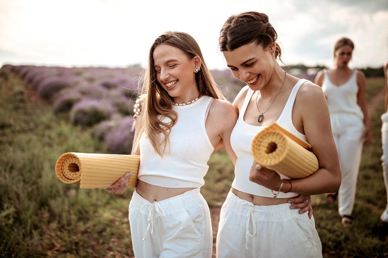 Relaxed women going to yoga class